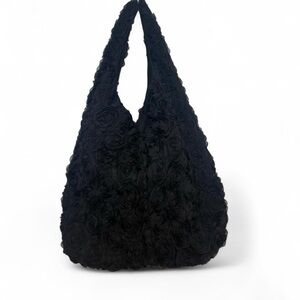 Motta black handbag covered with rosettes